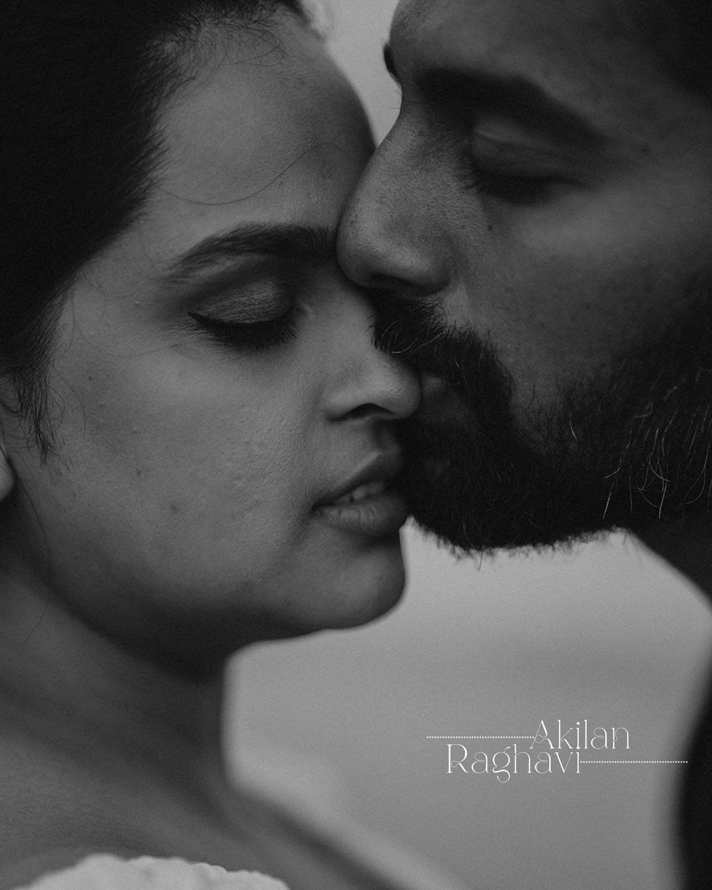 An intimate black and white portrait of a couple